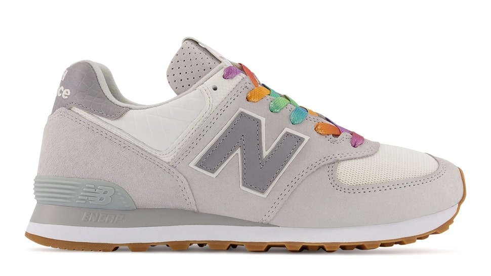 The grey trainers feature a pop of colour with the rainbow laces. (New Balance)