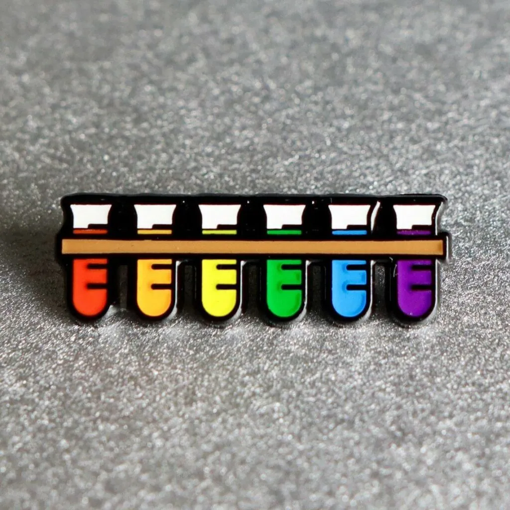 A test tube rack featuring the Pride colours. (ProudScience)
