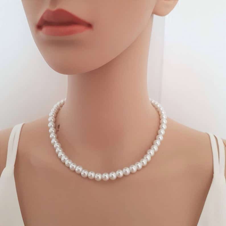 A pearl necklace to pair with a suit. (Etsy)