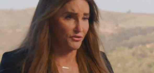 Caitlyn Jenner, with the dry Californian landscape behind her, speaks off to a camera facing her left