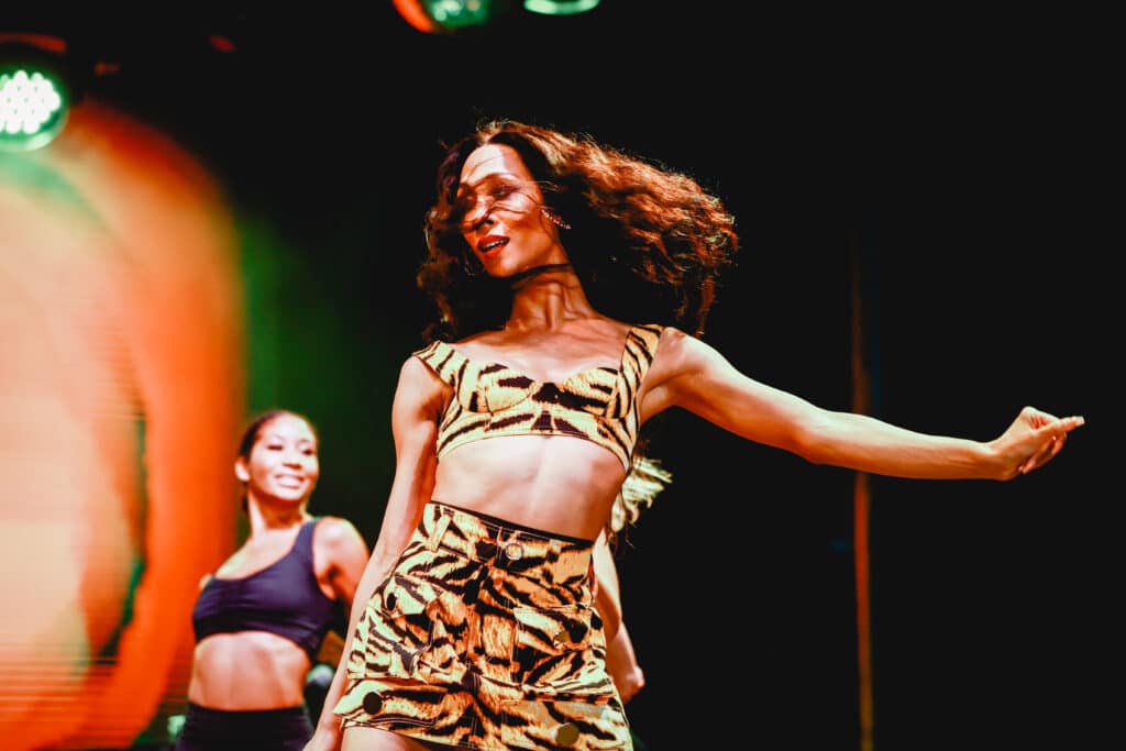 Mj Rodriguez performing on stage, dancing