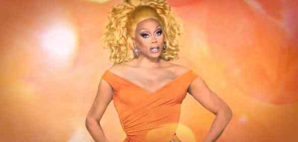 RuPaul in an orange dress