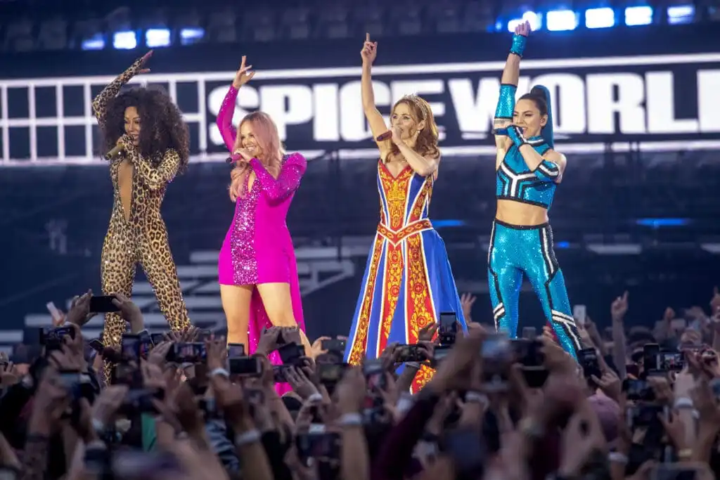 The Spice Girls performing on stage in 2019