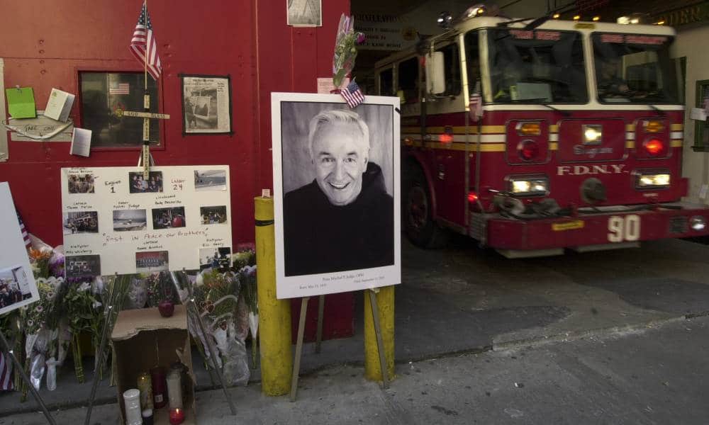 Mychal Judge is part of a memorial to victims of the World Trade Center attack outside of Engine Co. One/Ladder Co. 24 in midtown Manhattan