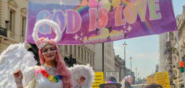 LGBT+ Christians at Pride in London, 2018, with a banner that reads: "God is love"