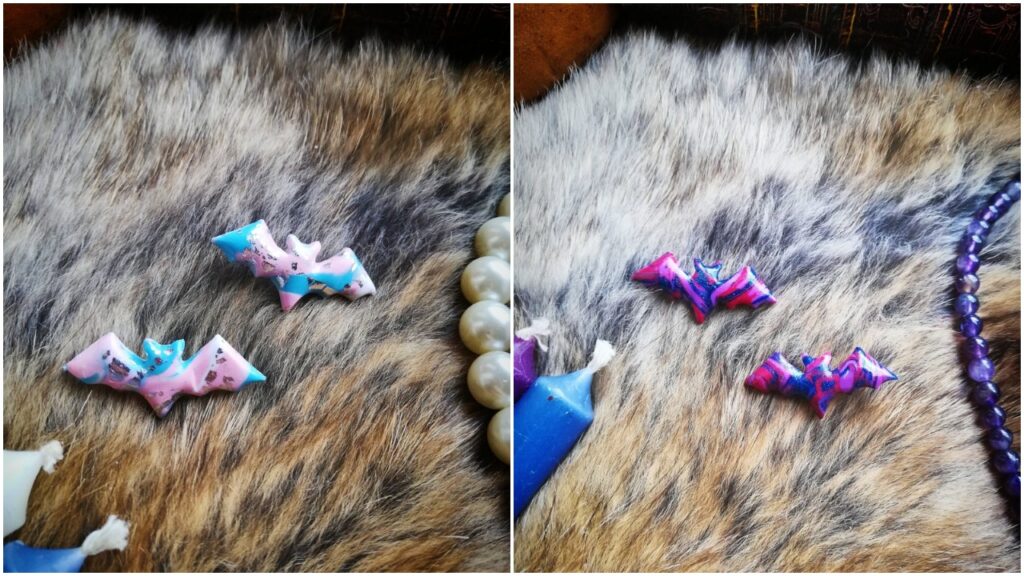 These cute bat pins are available in different Pride flag colours. 