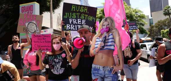 Junior Olivas and other Free Britney activists marching in Los Angeles