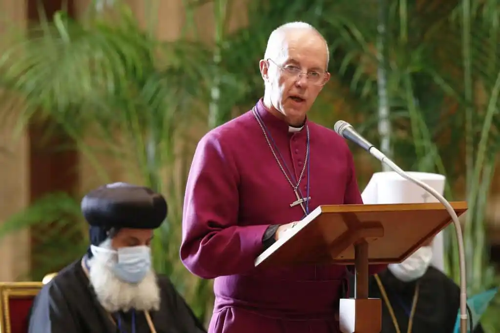 Anglican archbishop Justin Welby of Canterbury speaks at a podium