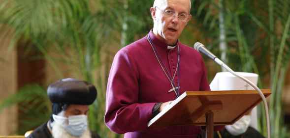 Anglican archbishop Justin Welby of Canterbury speaks at a podium