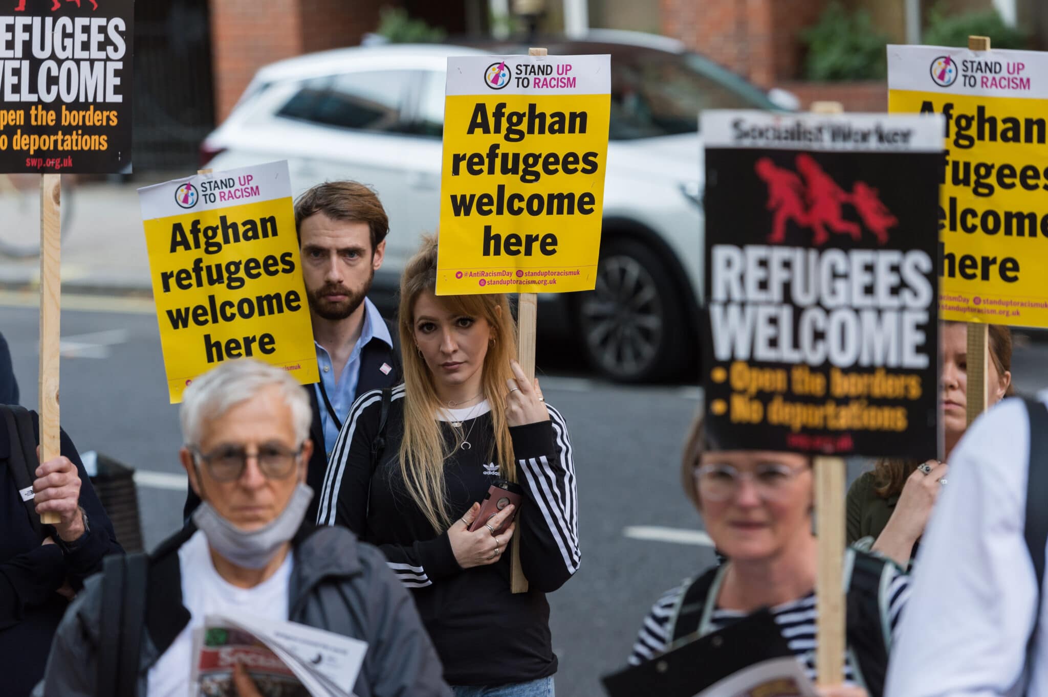 Demonstrators in London protest outside the Home Office demanding a safe passage to the UK for refugees fleeing Afghanistan