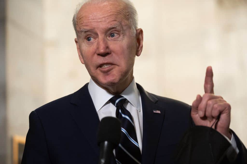 Joe Biden speaks to the press after meeting with the Senate Democratic Caucus on Capitol Hill in Washington, DC, January 13, 2022.