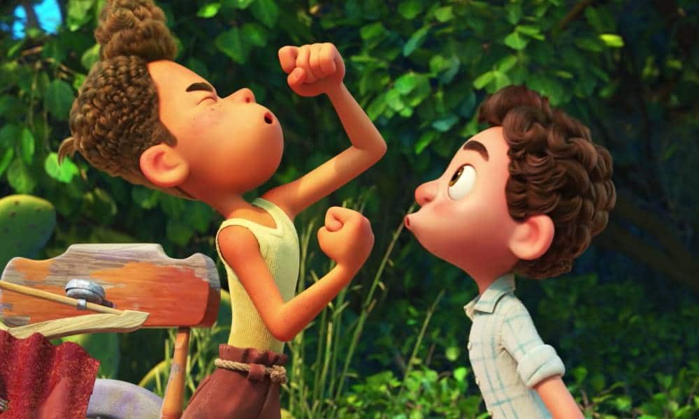 Luca main character Luca and Alberto chant together amid a background of lush greenery