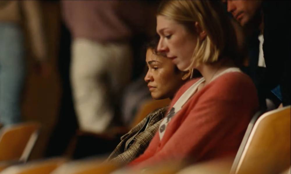 Rue (Zendaya) and Jules (Hunter Schafer) catch up in their high school's theatre in the finale of Euphoria's second season