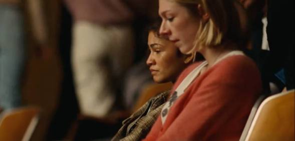 Rue (Zendaya) and Jules (Hunter Schafer) catch up in their high school's theatre in the finale of Euphoria's second season