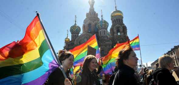 Gay rights activists march in Russia's second city of St. Petersburg May 1, 2013.