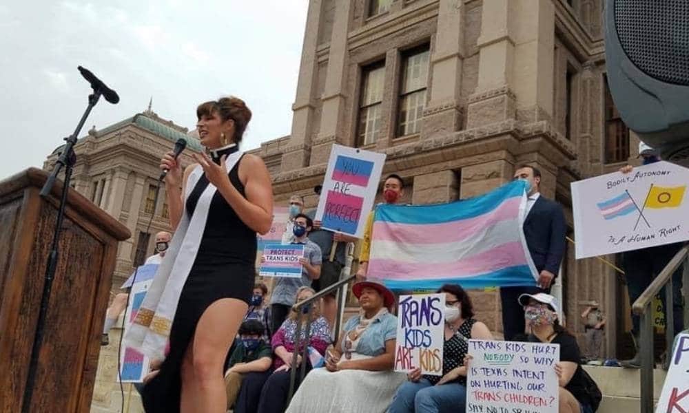 Reverend Remington Johnson speaks at a rally in support of trans youth