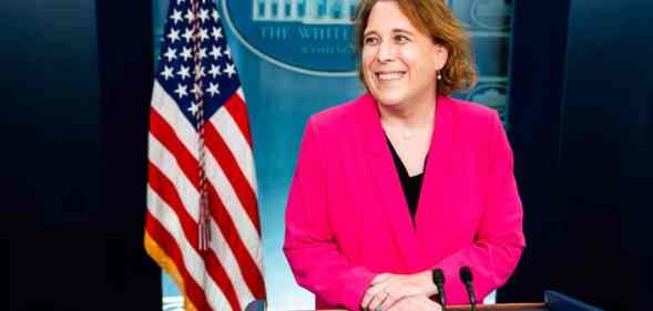 Jeopardy champion Amy Schneider wears a pink blazer and black outfit underneath as she visits the White House