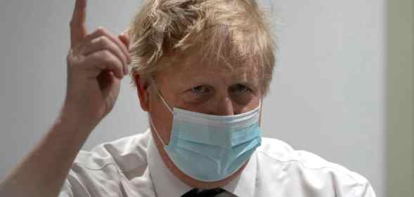 Boris Johnson wearing a face mask