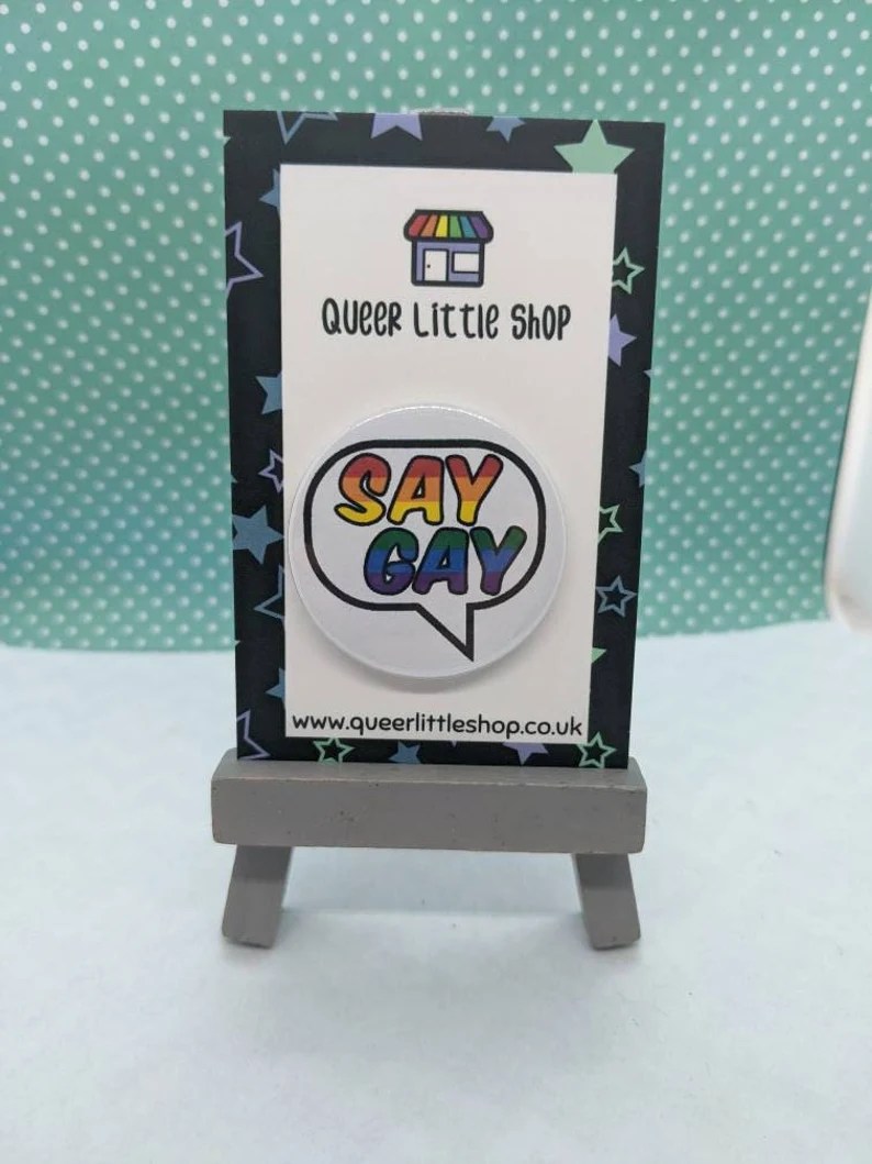 A "Say Gay" badge".