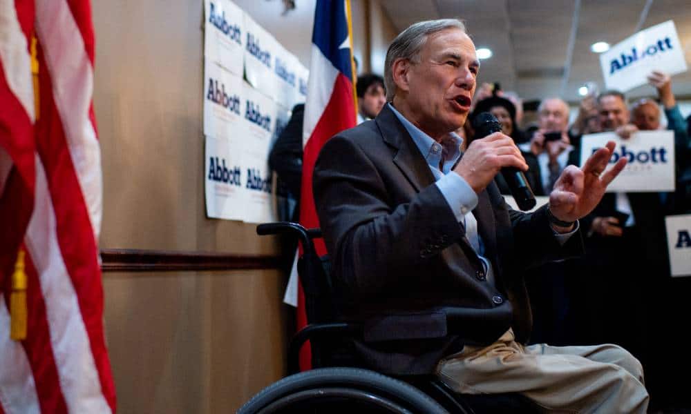 Texas governor Greg Abbott talks to a crowd during a campaign rally