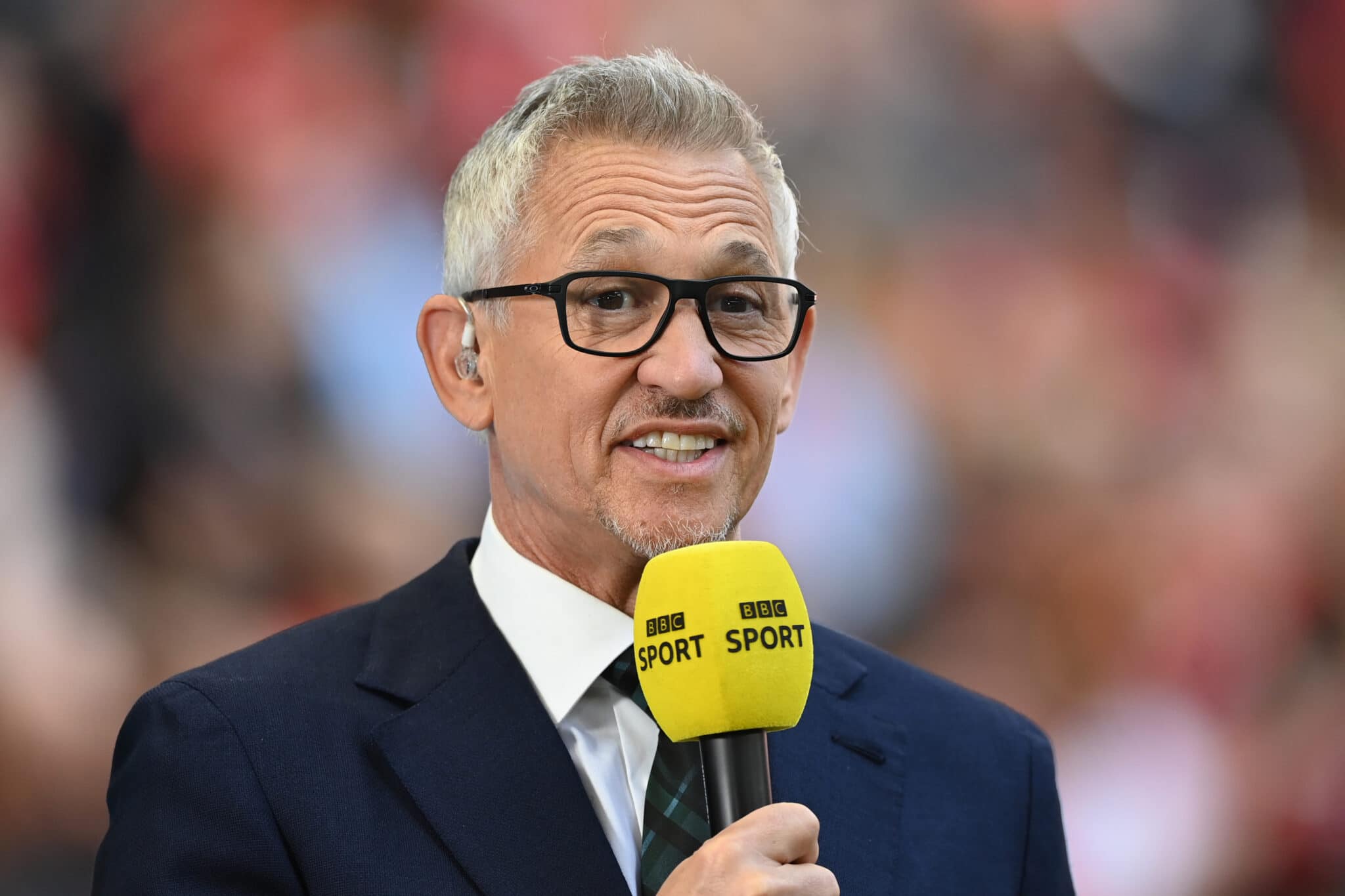Gary Lineker presenting at a match for The BBC.