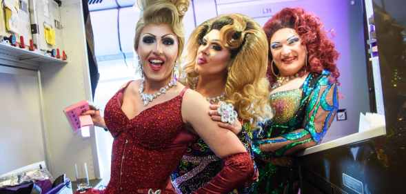Drag stars Tess Tickle, Emma Royed and Miss Cara on the Virgin Atlantic and Virgin Holidays Pride Flight from London to New York