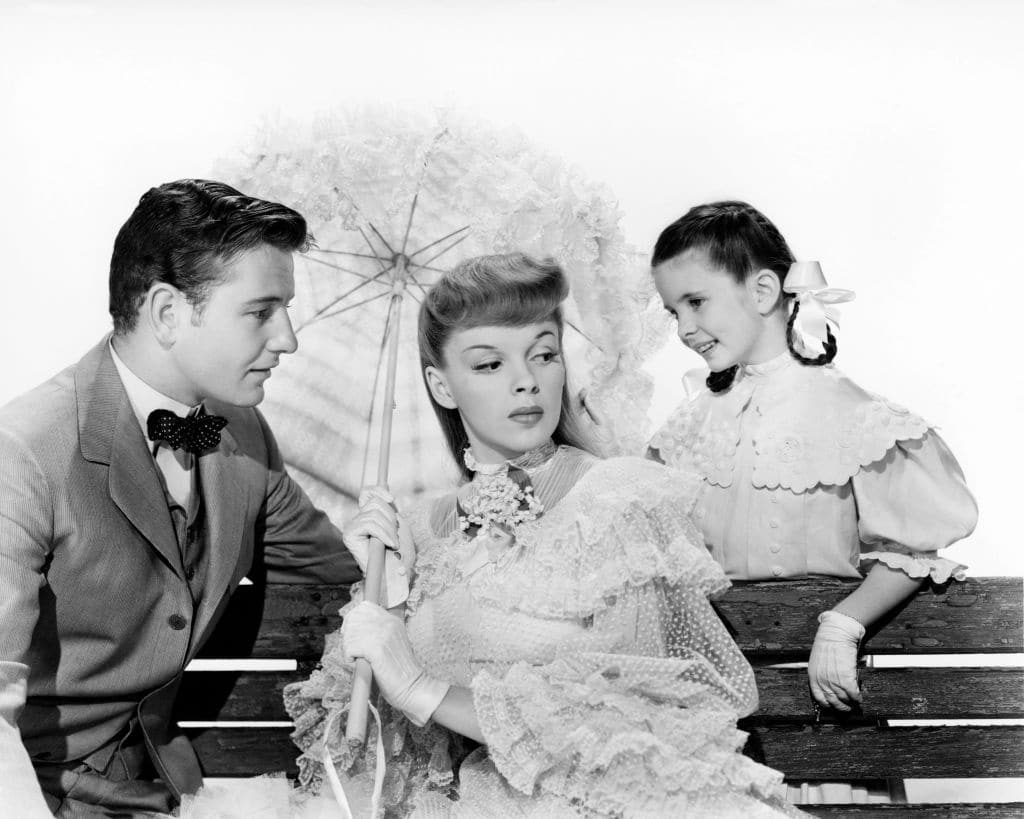 Tom Drake (1918 - 1982), Judy Garland (1922 - 1969) and Margaret O'Brien in a promotional portrait for Meet Me In St. Louis. 