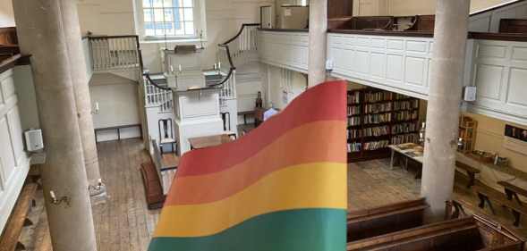 A Pride flag inside John Wesley's New Room