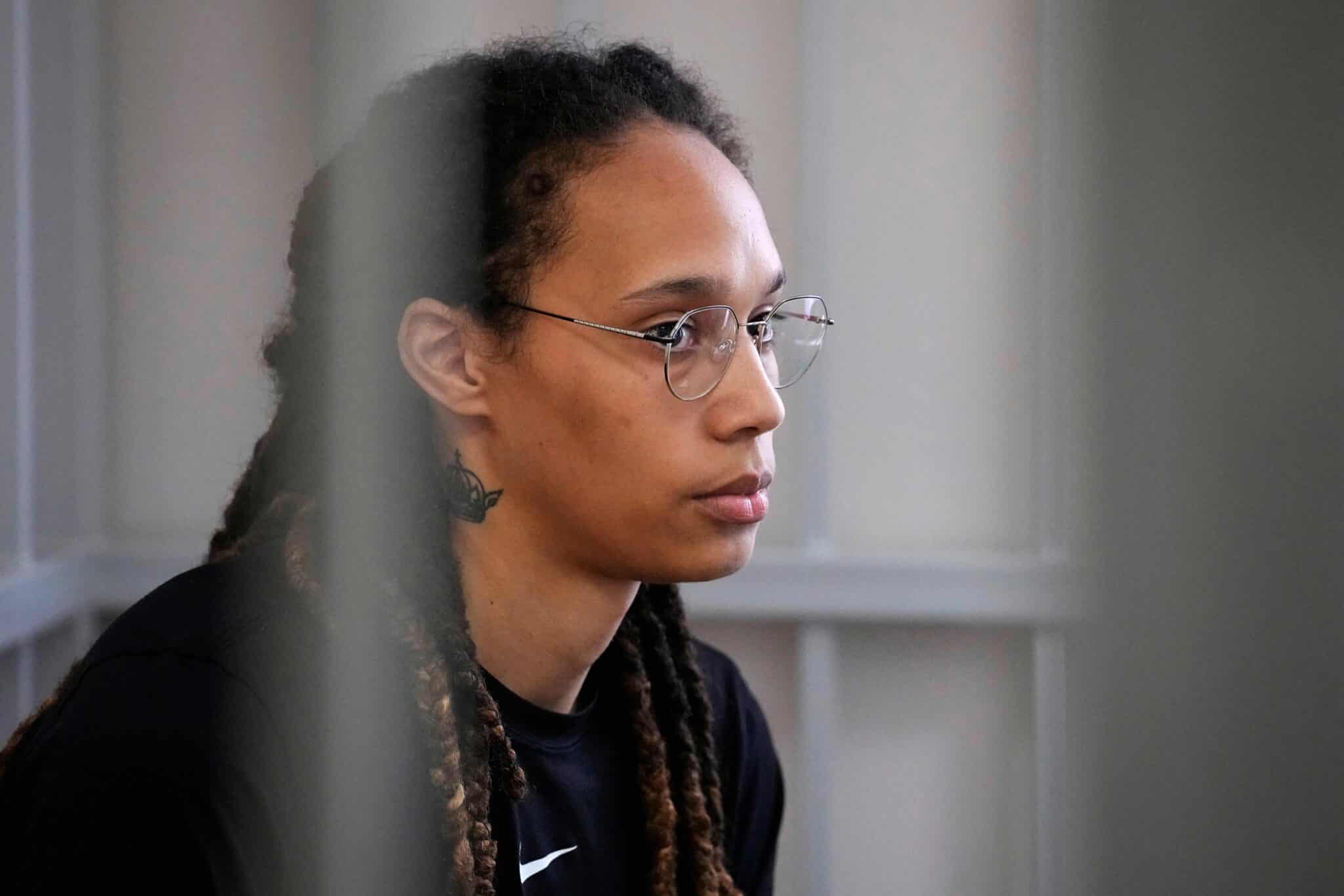 Brittney Griner sits in a prison cell