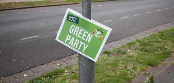 A placard promoting the Green Party hangs from a lamppost ahead of the by-election on June 18, 2022 in Wakefield, England.