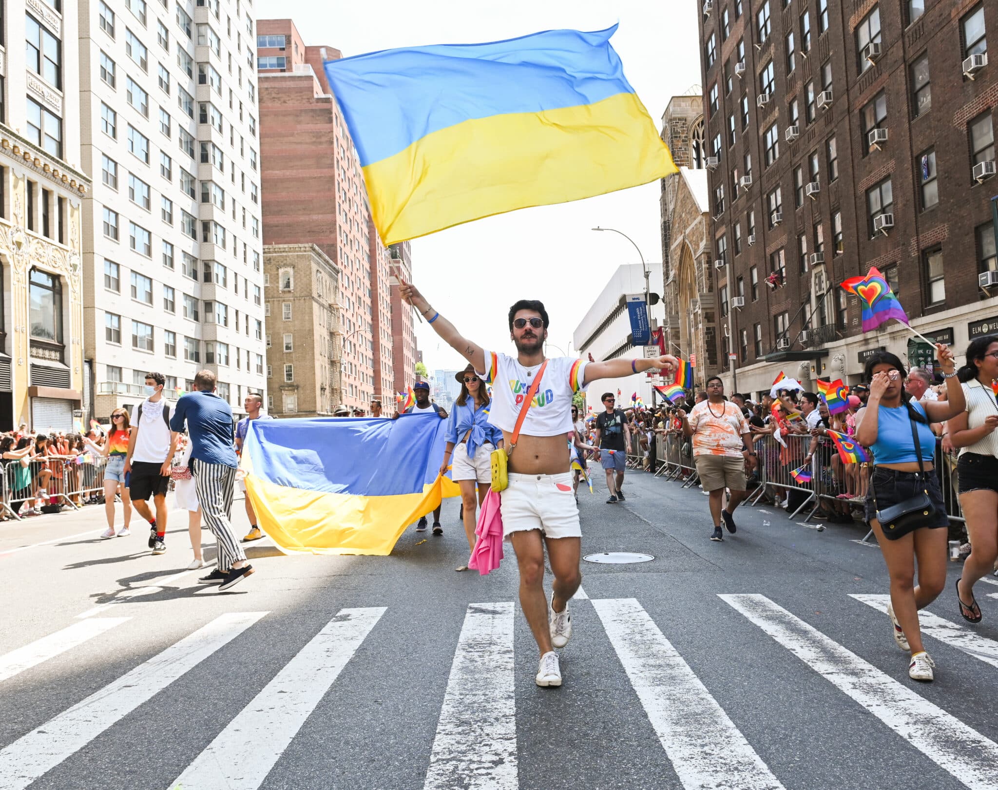 People wave the Ukrainian flag at the New York City Pride Parade on June 26, 2022 in New York City. 