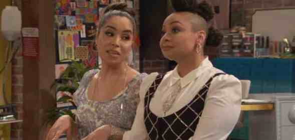 Raven's Home character Nikki (Juliana Joel) wears a white dress with a blue damask pattern on it as she speaks to Raven Baxter (Raven-Symoné). Raven is wearing a white button up shirt, glittery small tie and black and silver patterned vest. Her hair is styled up in three bunches running down her head.