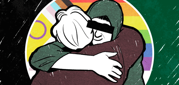 Two people are shown hugging against a progress Pride flag in an animation.