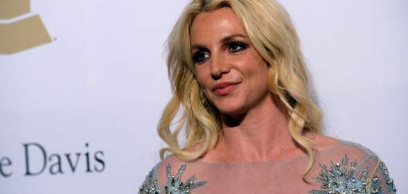 Britney Spears poses for a photo at an event