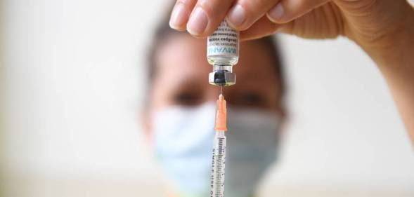 A photograph shows a syringe with a dose of the Monkeypox vaccine at the Edison municipal vaccination centre in Paris