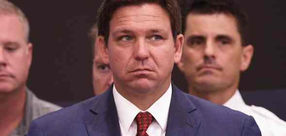 In this photograph, Ron DeSantis speaks at a press conference