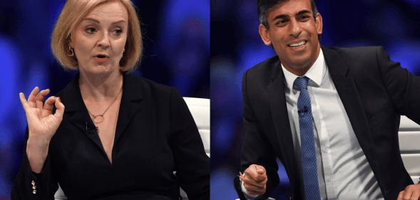 Liz Truss and Rishi Sunak sit on stage during a leadership hustings.