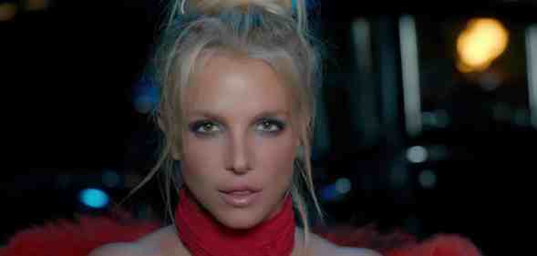 Britney Spears in a red halterneck top