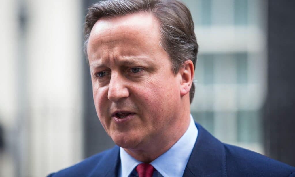 Prime minister David Cameron stares at someone off camera
