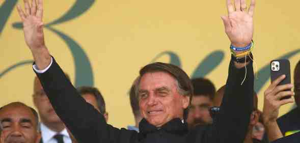 Current president of Brazil and candidate for re-election Jair Bolsonaro greets supportes during a campaign rally.