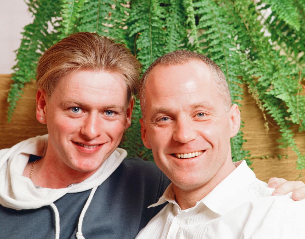 Michael Cashman, actor and partner Paul Cottingham, pictured at home together in Bow, east London, 24th April 1990. 