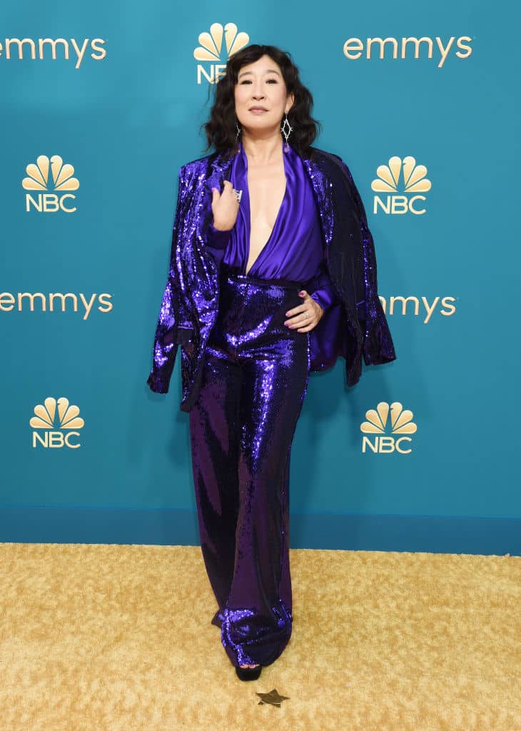 Sandra in a glittering purple jumpsuit