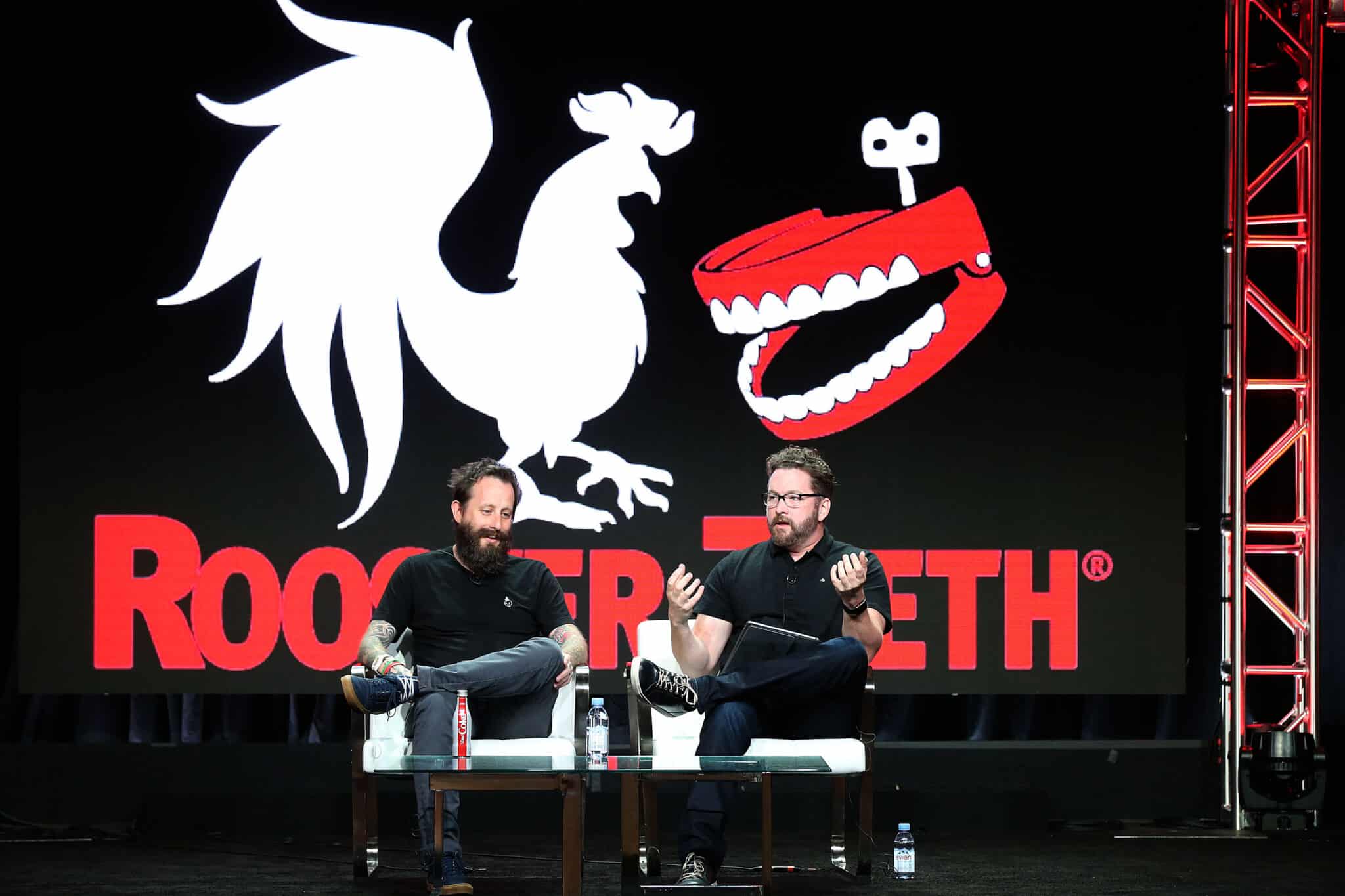 Geoff Ramsey and Burnie Burns of Rooster Teeth at a panel. 
