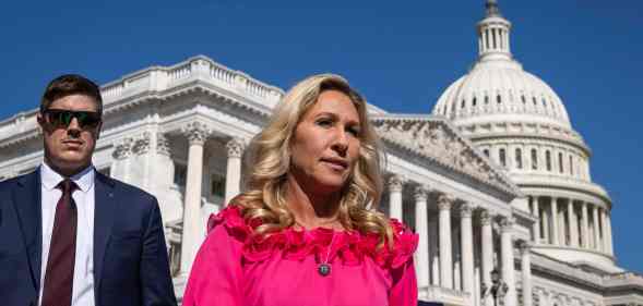 Rep. Marjorie Taylor Greene (R-GA) arrives for a news conference on Capitol Hill