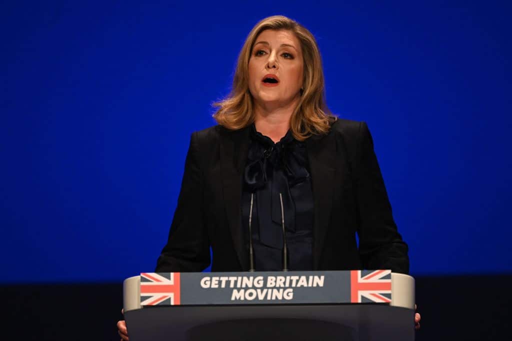 Britain's Leader of the House of Commons Penny Mordaunt delivers a tribute to Queen Elizabeth II on the opening day of the annual Conservative Party Conference.