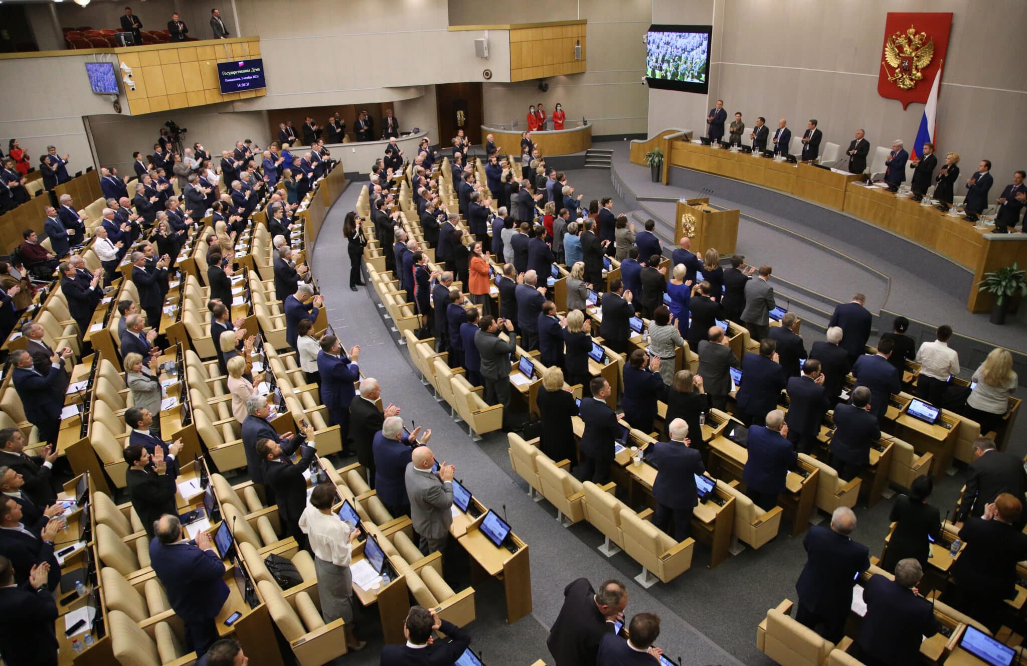 Russian State Duma deputies attend a meeting inside parliament.