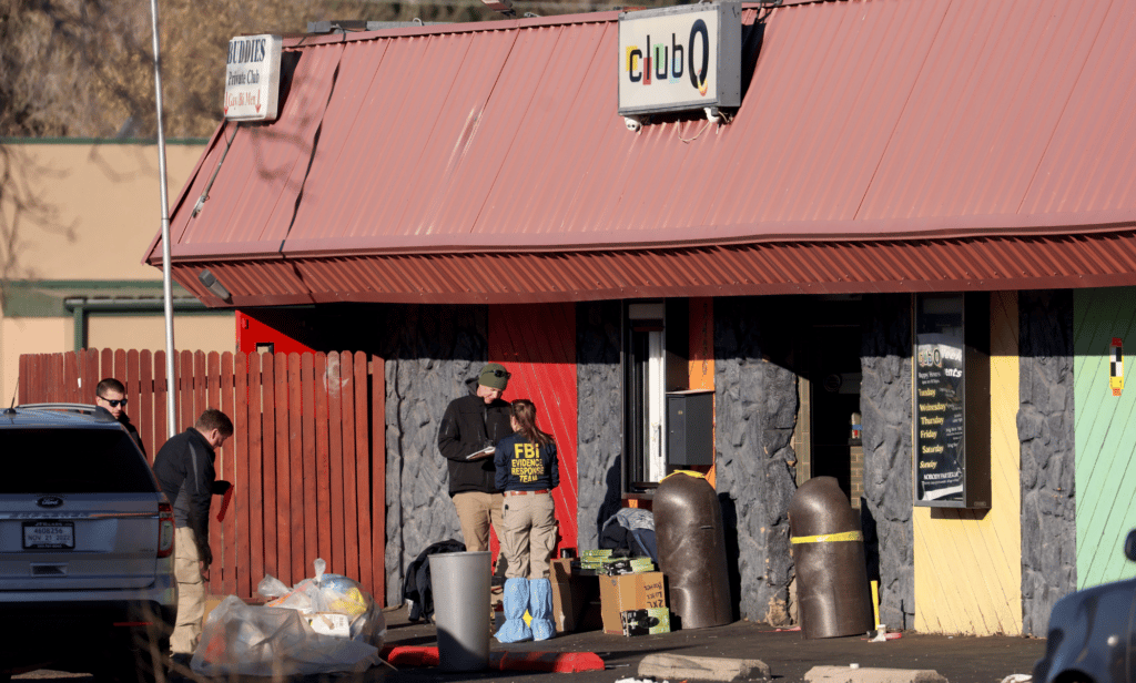 Federal and local law enforcement stand outside Club Q in Colorado Springs, Colorado which was the scene of a mass shooting. The suspect in the shooting has been identified as Anderson Lee Aldrich