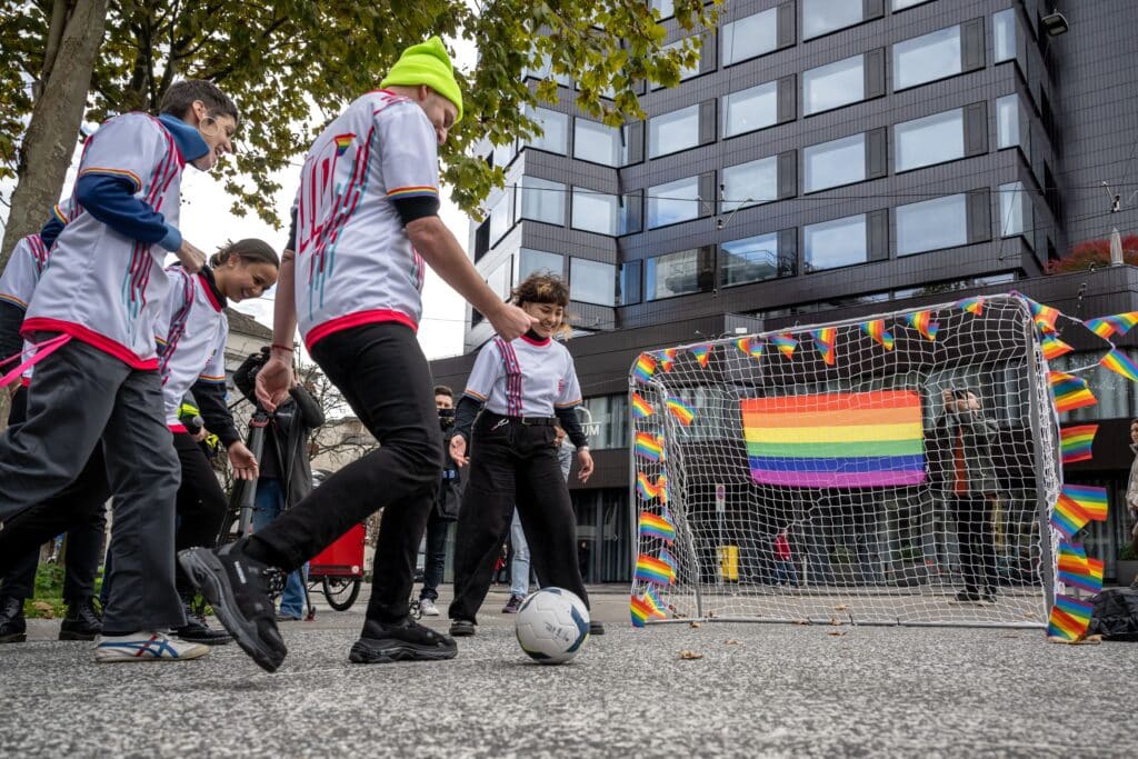 Activists play football 