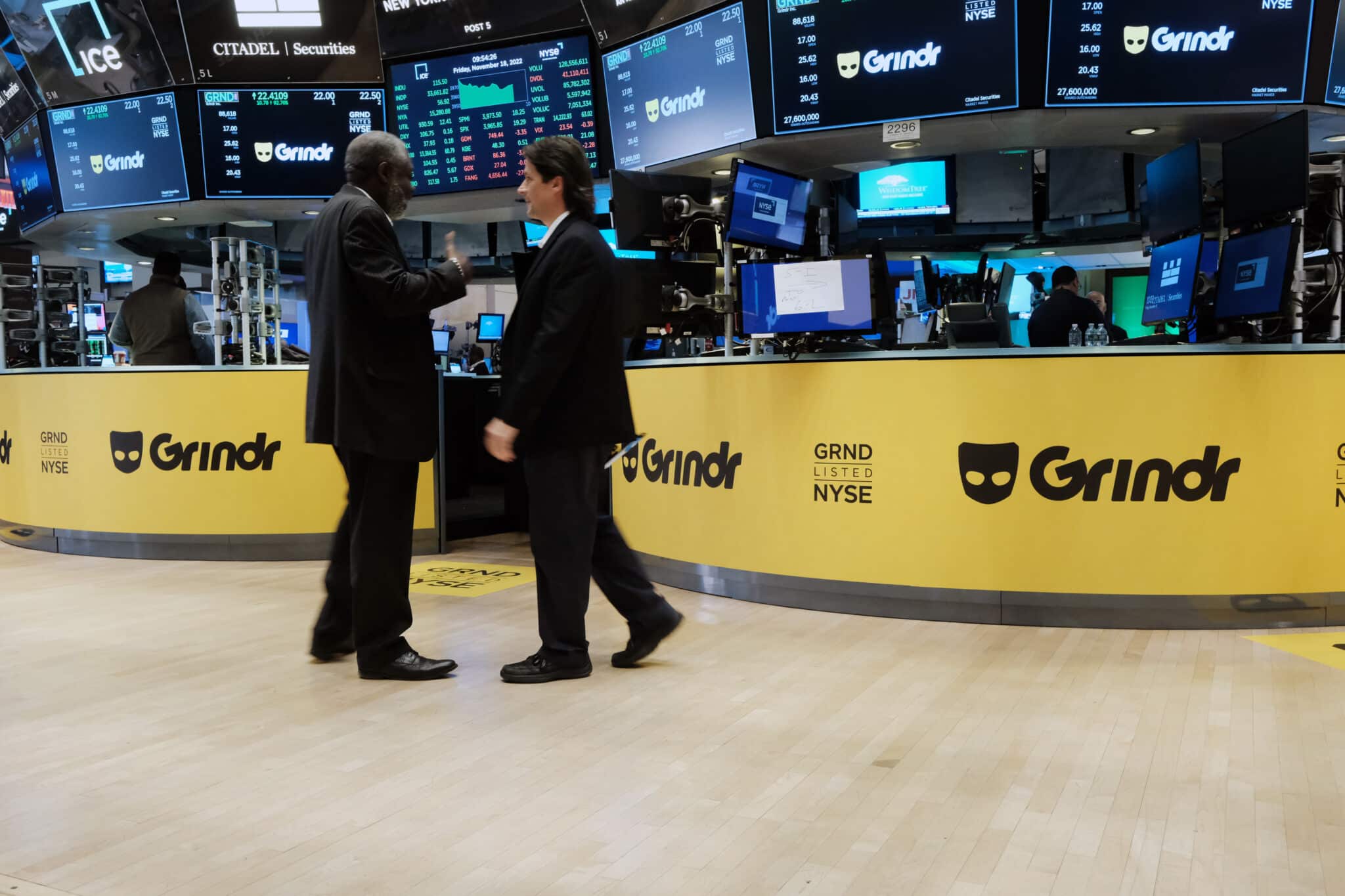 Traders work on the floor of the New York Stock Exchange (NYSE) as the LGBTQ social networking platform Grindr goes public. 