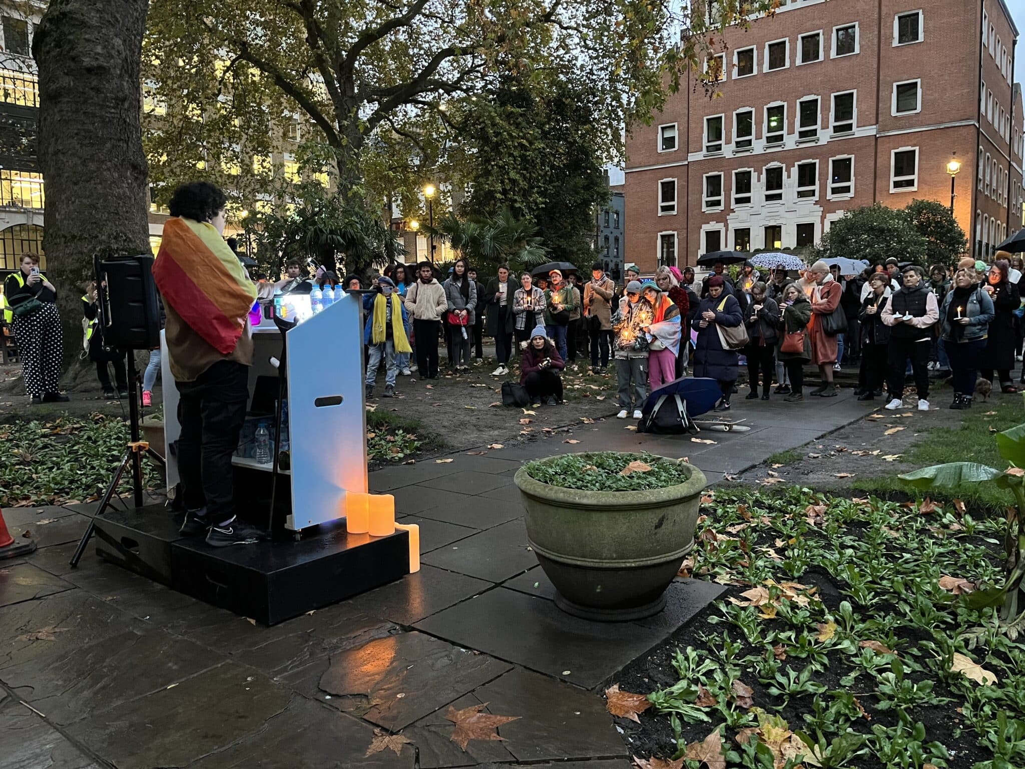 A trans activist speaks during the Soho Square Trans Day of Remembrance.